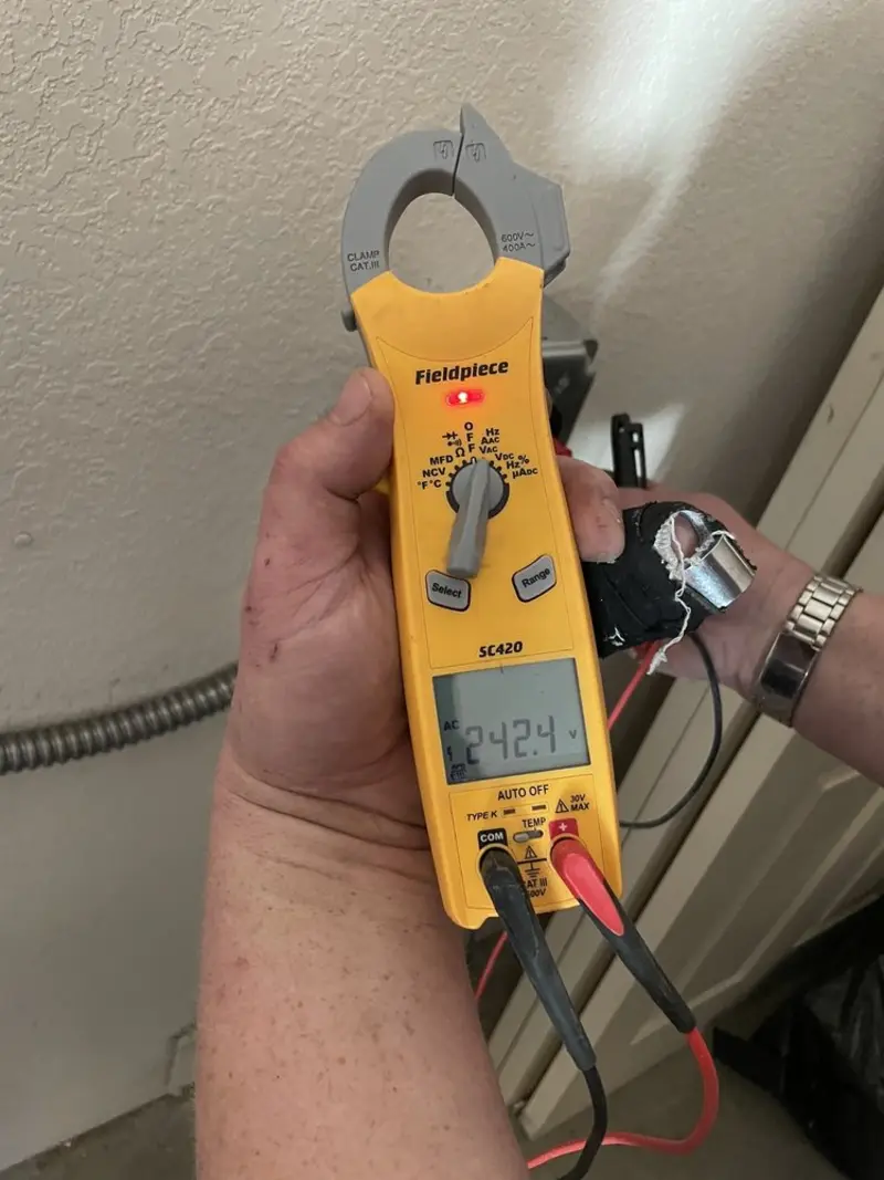 Voltage testing with clamp meter during Circuit Breaker Repair in Finneytown